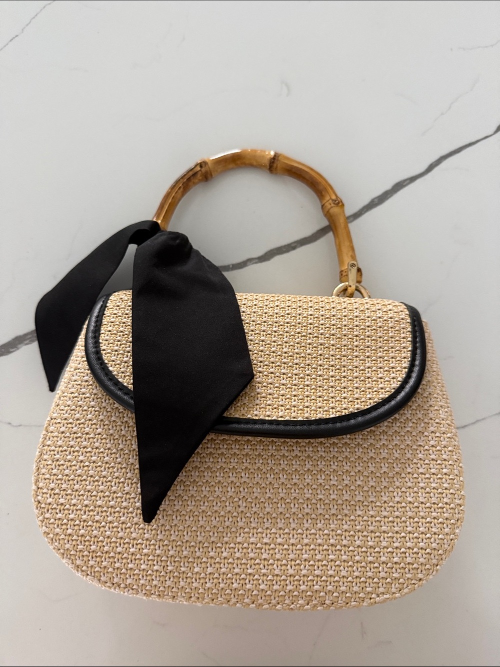 Woven Straw Top-Handle Bag with Bamboo Handle and Black Trim